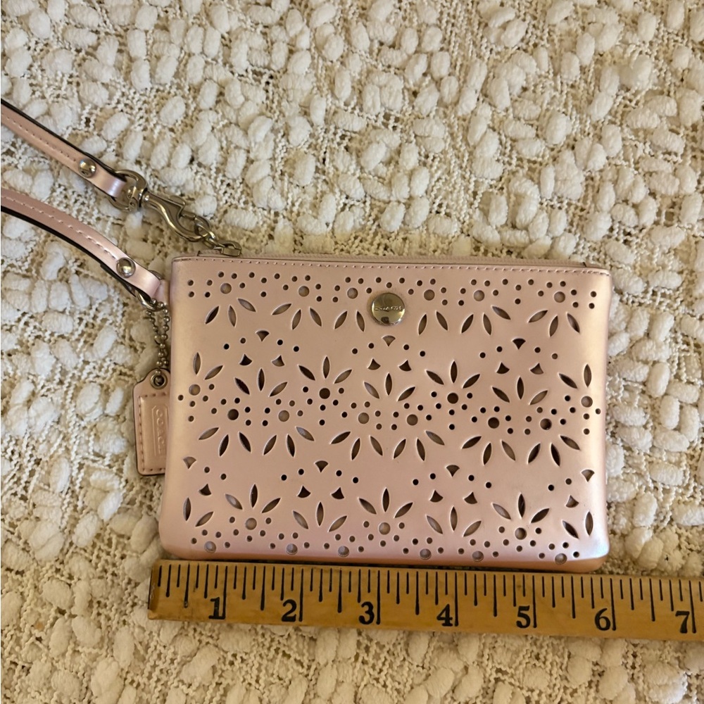 Coach Metallic pink clutch/wristlet. New w/o tags.